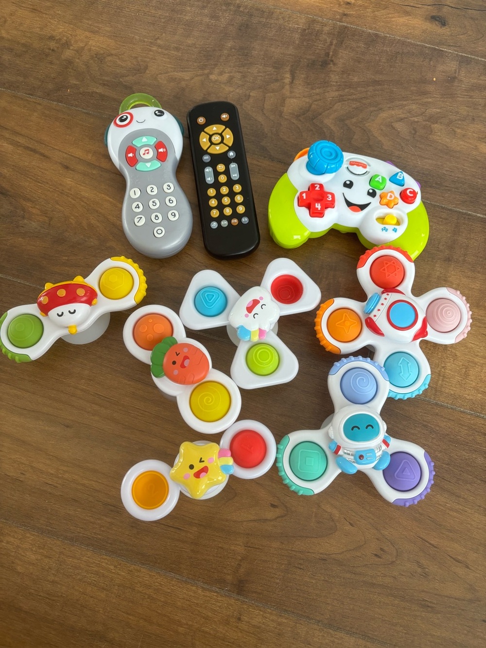 Toddler toy bundle fisher price controller and spinners